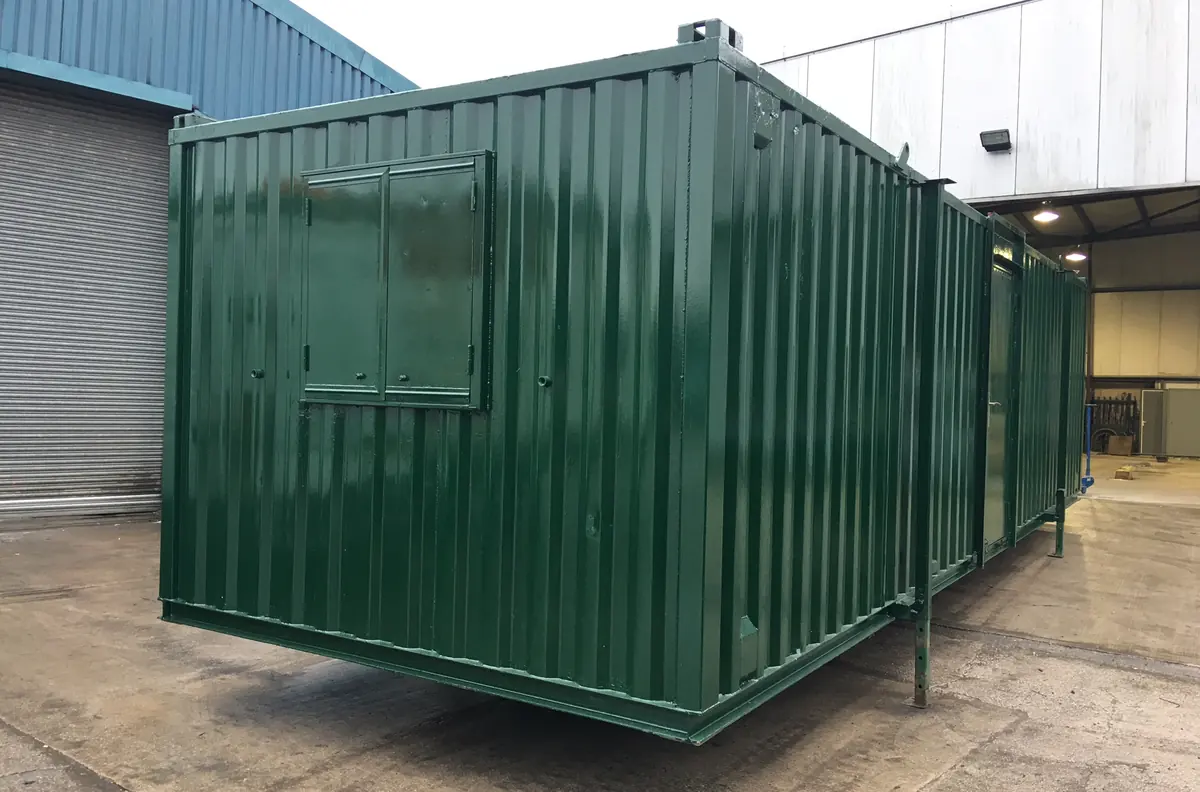 Used anti-vandal steel site cabin with window shutters closed and secure steel door