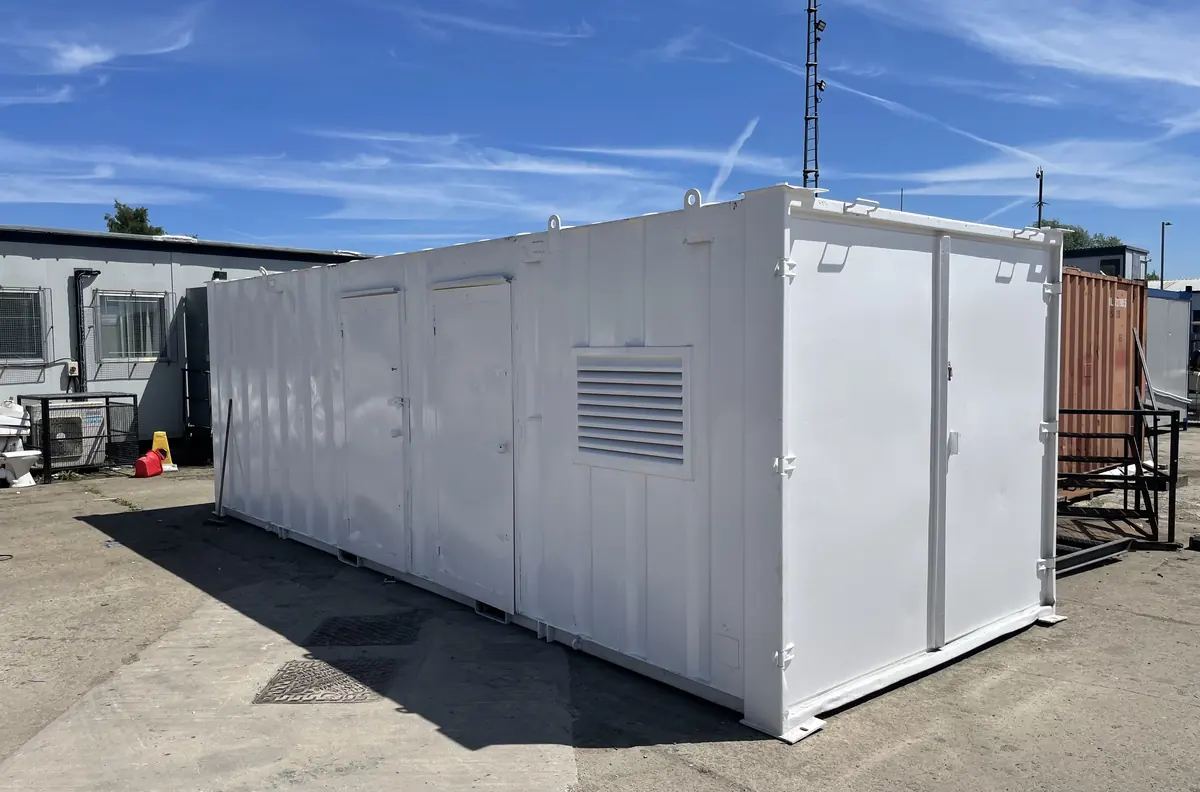 Refurbished used portable cabin with new windows and repainted steel cladding