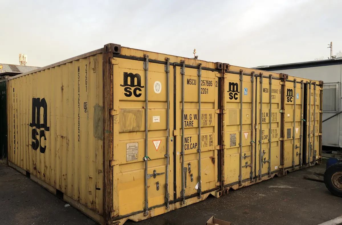 Used 20ft shipping container with the doors open showing the floor inside
